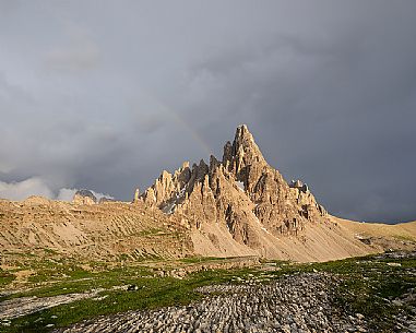 The magic light of sunset warms the Mount Paterno after a storm in a summer evening, Tre Cime natural park, dolomites, Trentino Alto Adige, Italy, Europe