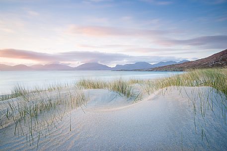 Sunset on Luskentyre beach in the Outer Hebrides on the Isle of Harris, Scotland.