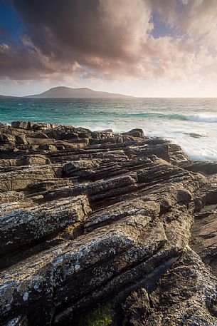 Sunset on the rocks near Na-Buirgh in the Outer Hebrides on the Isle of Harris, Scotland.