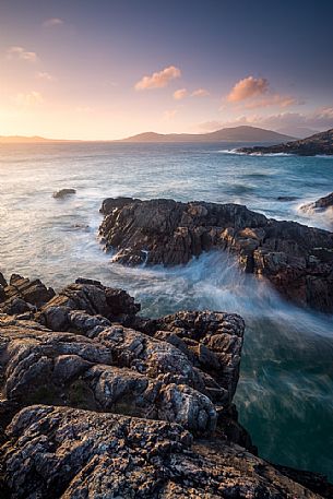 Sunset on the rocks near Na-Buirgh in the Outer Hebrides on the Isle of Harris, Scotland.