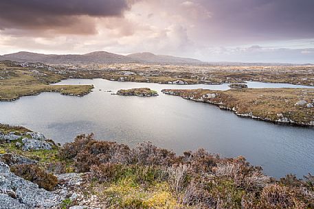 Sunset near Finsbay between Loch Meurach and Loch a 'Gheoidh in the Outer Hebrides on the Isle of Harris, Scotland.