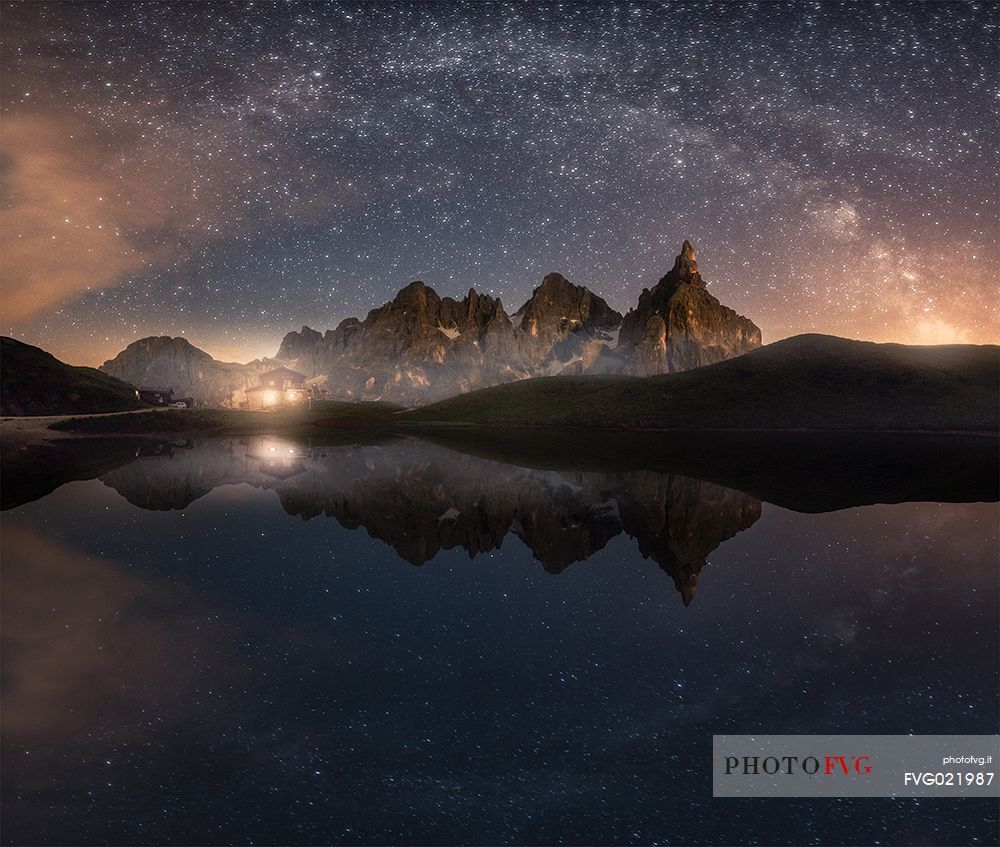 Starry over Segantini refuge and Pale di San Martino mountains, dolomites, Italy