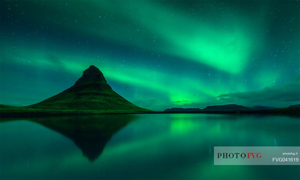 Aurora borealis over Kirkjufell, Iceland, Europe
