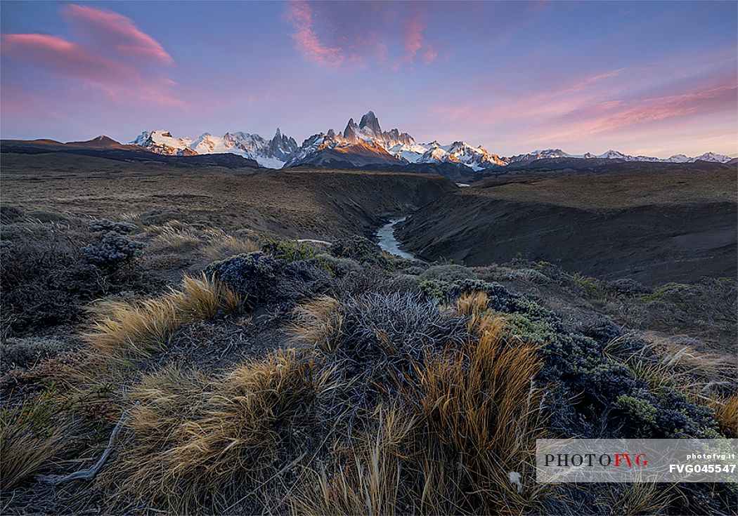 Steppe landscape with Mount Fitz Roy also called Cerro Chalten behind at sunrise, El Chaltn, Patagonia, Argentina