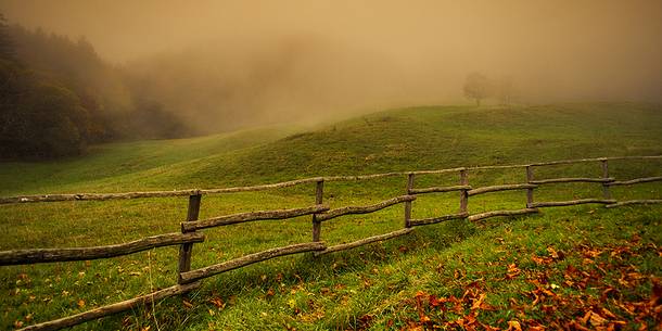 sunset over the tuscany hills in autumn