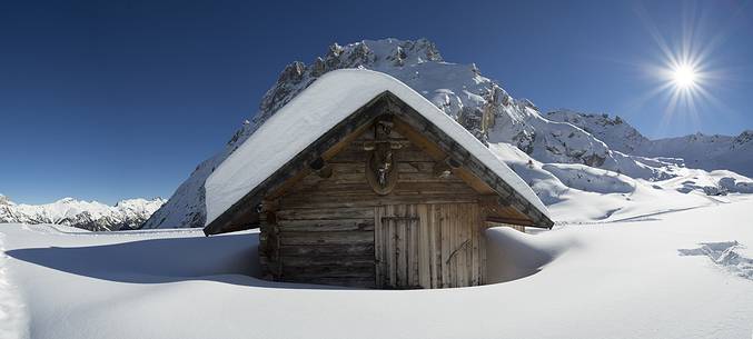 Alpine panorama of snowy canazei