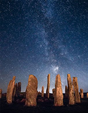Nightview of Stones of Callanish, stone circles arranged like the Stonehenge in Great Britain, at the Loch Roag, Isle of Lewis, Scotland, UK