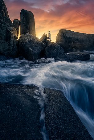Sunset at Pontusval lighthouse, brittany landscape and seascape, France