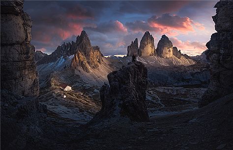 Panoramic view of the Tre Cime di Lavaredo and Paterno mount with Locatelli refuge at sunset, Sexten dolomites, Italy, Europe