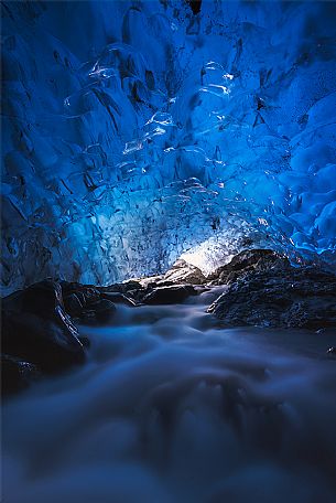 River inside icecave near Jokulsarlon lagoon, Vatnajökull glacier, Iceland, Europe 