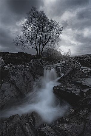 Cloudy day at Coupall Falls on River Coupall and Buachaille Etive Mor mountain, Highlands, Scotland, Europe