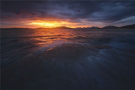 Sunset from the rocks of Luskentyre, Isle of Harris, Outer Hebrides, Scotland, United Kingdom, Europe