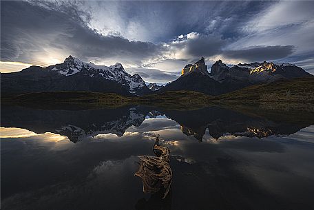 Torres del Paine reflecting in lake Pehoe at sunset, Patagonia, Chile