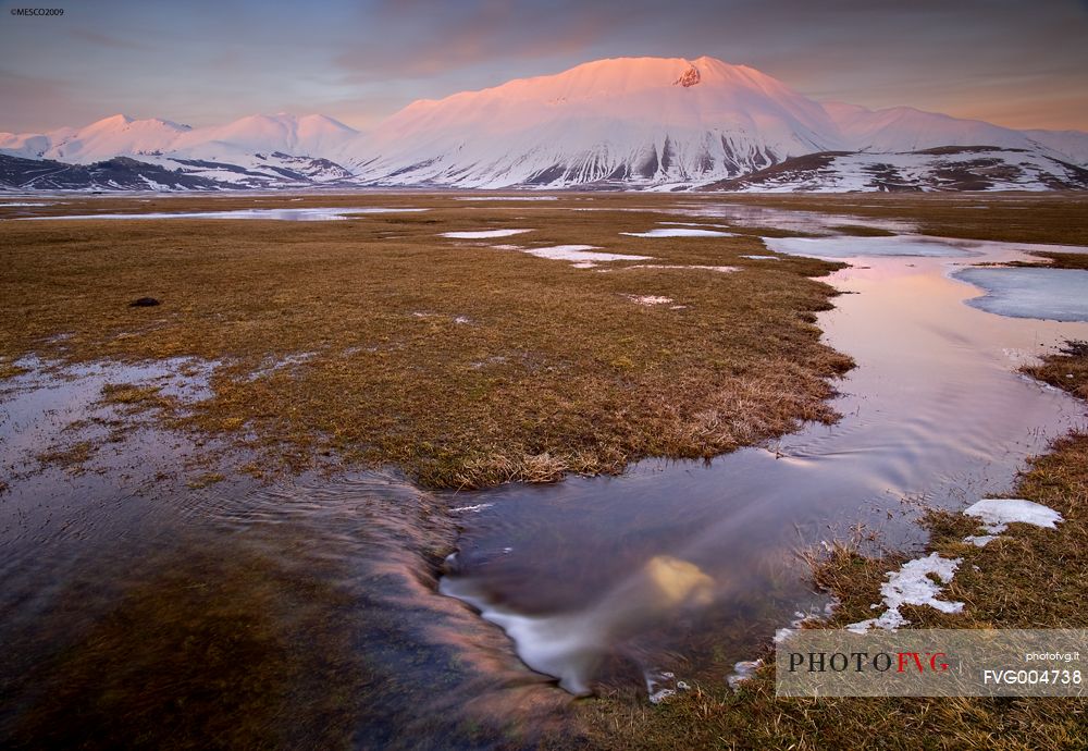 Amazing light on Redentore mountain's , during a beautiful day in spring.