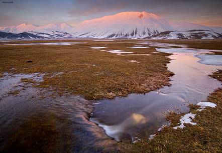 Amazing light on Redentore mountain's , during a beautiful day in spring.