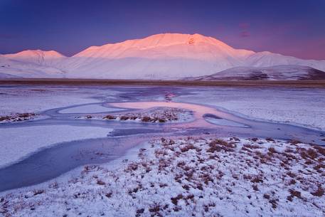 Fantastic sunset at -18  on the plain of Castelluccio di Norcia in the middle of winter.