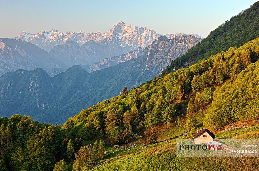 Lodina refuge at dawn with the Col Nudo Group in the background