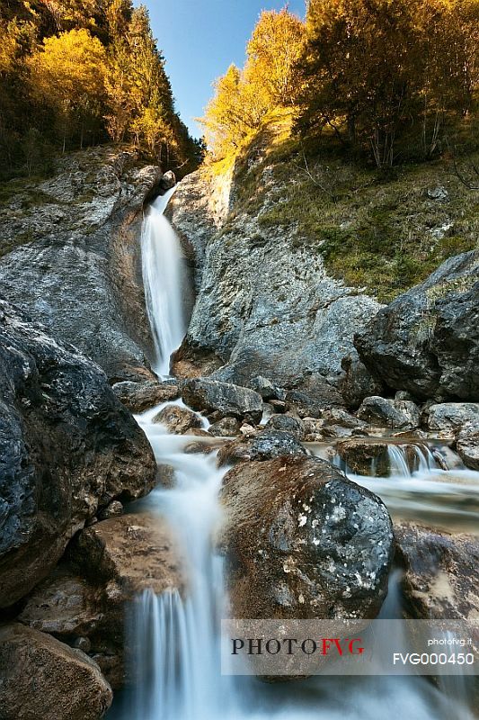 Alpine river in Cimoliana Valley in autumn