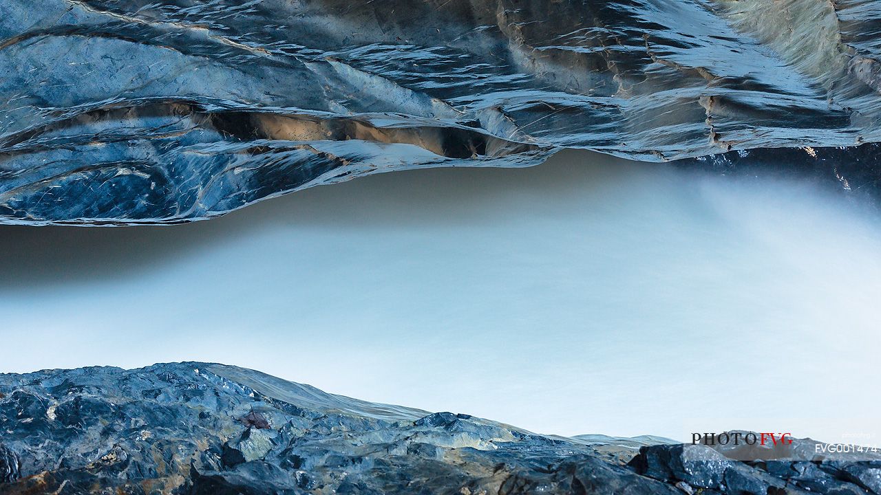Detail of Trummelbach underground waterfalls formed by melting waters of Jungfrau glacier, Lauterbrunnen valley, Switzerland, Europe