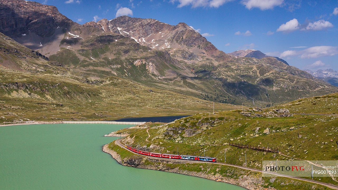 Rhaetian railway, Route from St. Moritz - Tirano, UNESCO World Heritage Site, at Bernina pass with Lago Bianco Lake, Engadin, Canton of Grisons, Switzerland, Europe