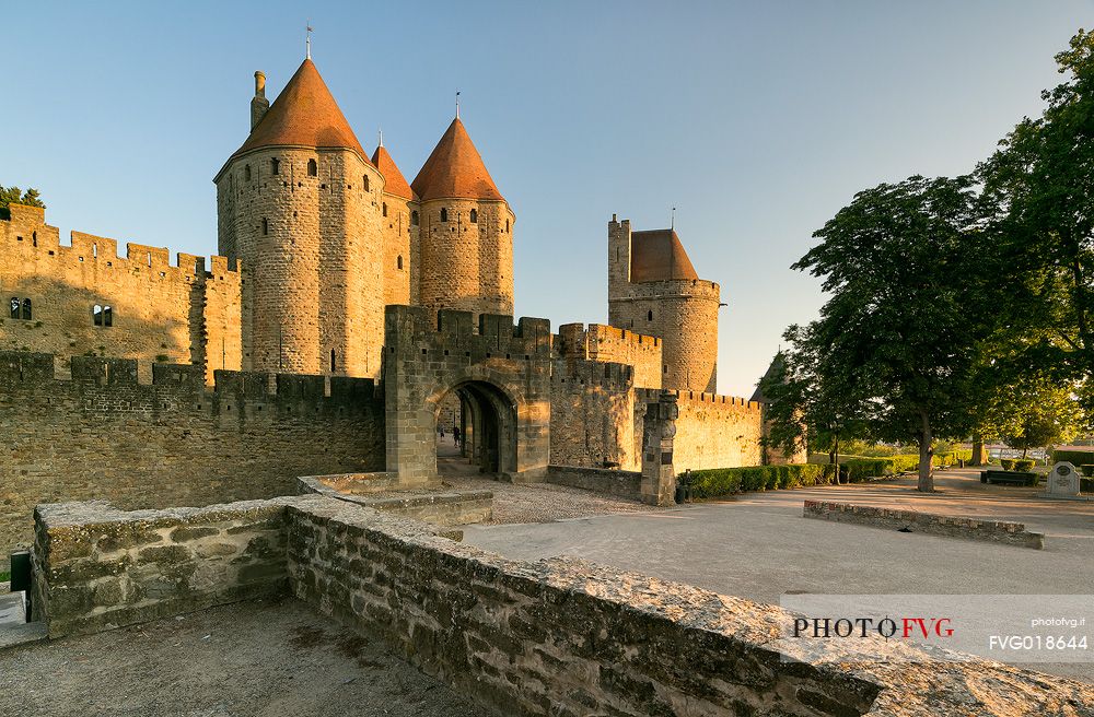 The mediavel ancient city of Carcassonne in warm light of sunrise