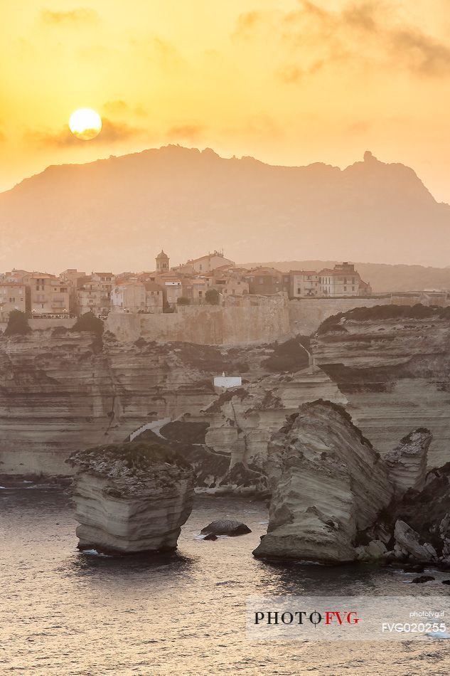White cliffs and the old village of Bonifacio at sunset, Corsica