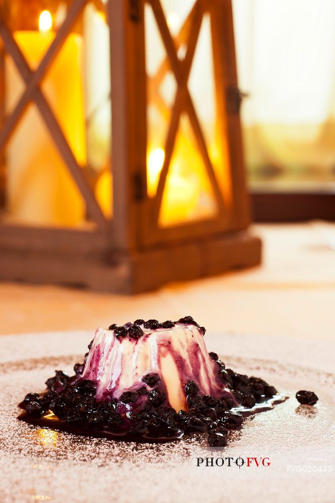 Panna cotta with blueberries, typical dessert of Morgenleit restaurant, Sauris