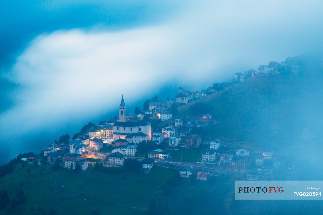 The alpine village of Casamazzagno in the evening, Comelico, dolomites, Italy