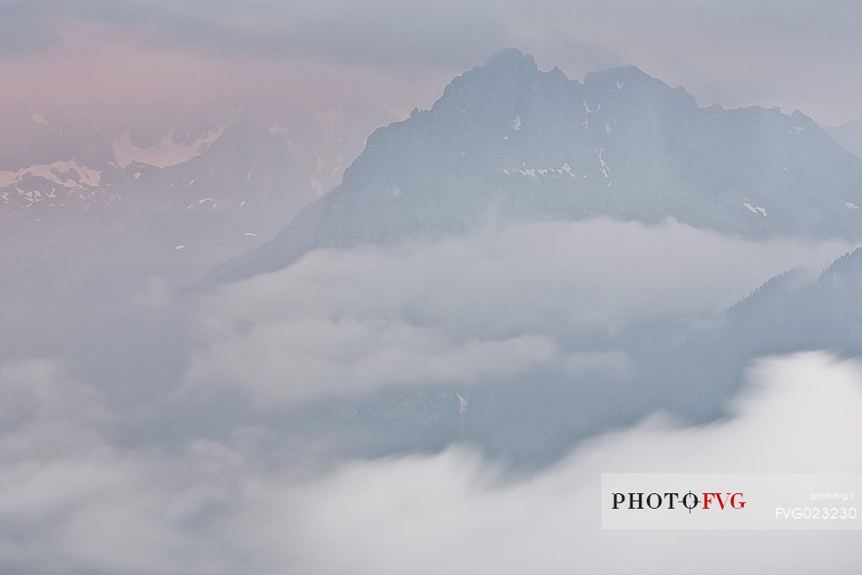 Overcast landscapes of the dolomites from Passo Sella toward Val di Fassa Valley, Trentino, Italy