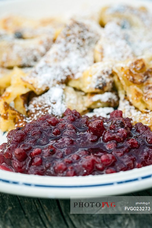 Kaiserschmarren, typical omelet with cranberries, South Tyrol, Dolomites, Italy