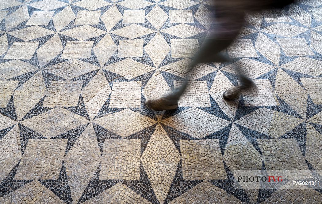 The floor mosaic in the archaeological site of Basilica of Concordia Sagittaria, Venice, Italy