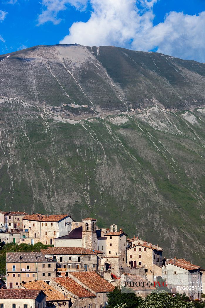 The old village of Castelluccio di Norcia before the disastrous earthquake of 2016 ant in the background the mount Vettore and its fault, Italy