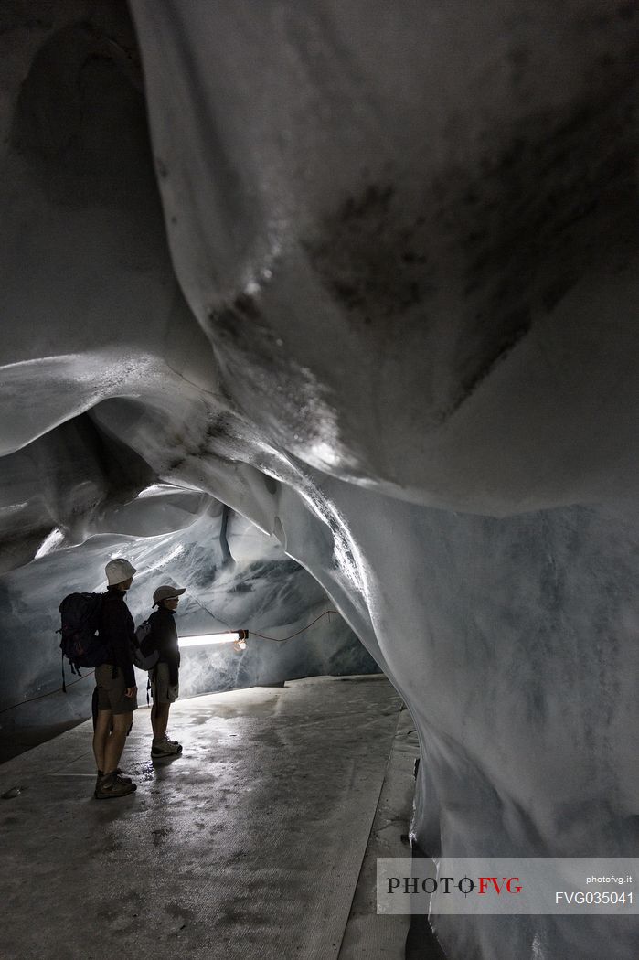 Tourists inside the Titlis glacier, Engelberg, Canton of Obwalden, Switzerland, Europe