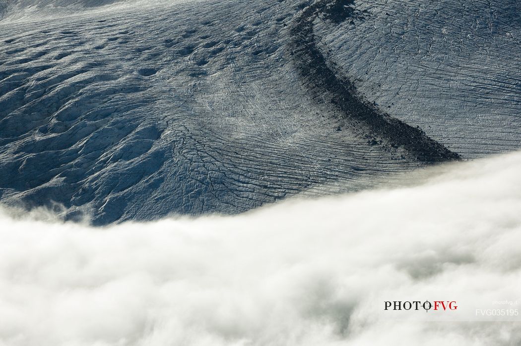 Detail of Gorner glacier in the fog from Gornergrat top, Monte Rosa or Breithorn mountain range, Zermatt, Valais, Switzerland, Europe
 