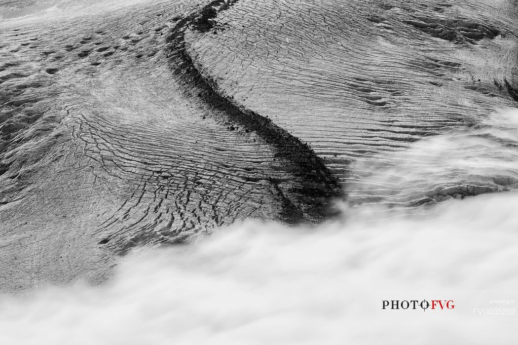 Detail of Gorner glacier in the fog from Gornergrat top, Monte Rosa or Breithorn mountain range, Zermatt, Valais, Switzerland, Europe
 