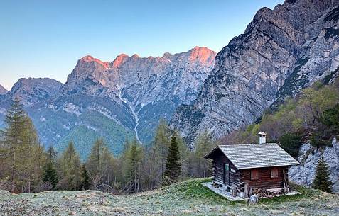 Caserata refuge at sunrise with the Caserine-Cornaget mountain group in the background Caserata refuge at sunrise with the Caserine-Cornaget mountain group in the background