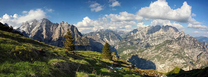 Spring meadows above Lodina Refuge with Laste-Preti and Vacalizza Mountain Group in the background Spring meadows above Lodina Refuge with Laste-Preti and Vacalizza Mountain Group in the background