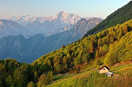 Lodina refuge at dawn with the Col Nudo Group in the background