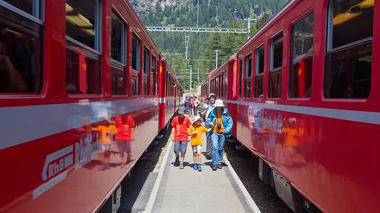Tourists at the Cavaglia train station, Bernina Express train, Rhetic railways, Canton of Grisons, Switzerland, Europe