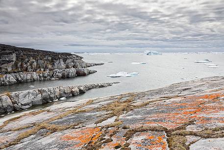 Cliffs of Rodebay a small village of fishermen and seal hunters in Disko Bay