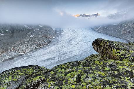 Rhone glacier in the mist of a clear morning dawn, Furka pass, Valais, Switzerland, Europe