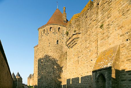 The mediavel ancient city of Carcassonne in warm light of sunrise