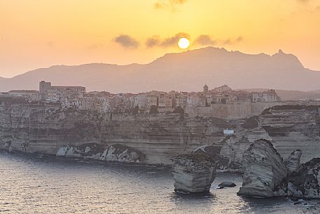 White cliffs and the old village of Bonifacio at sunset, Corsica