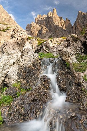 Waterfall in the Popera mountain group, Dolomites of Sesto, South Tyrol, Italy