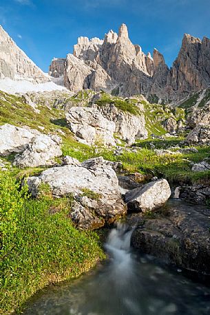 Waterfall in the Popera mountain group, Dolomites of Sesto, South Tyrol, Italy