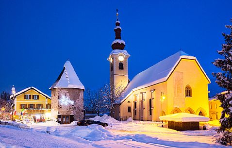 Tarvisio's church after an heavy snowfall. Tarvisio in an alpine town near the border with Austria and Slovenia