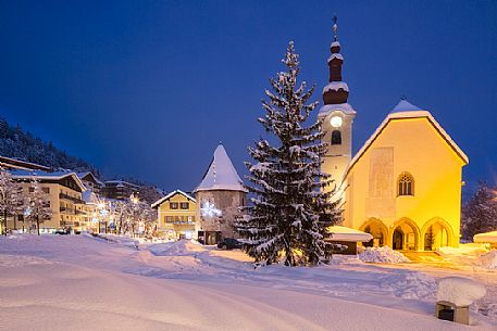 Tarvisio's church after an heavy snowfall. Tarvisio in an alpine town near the border with Austria and Slovenia