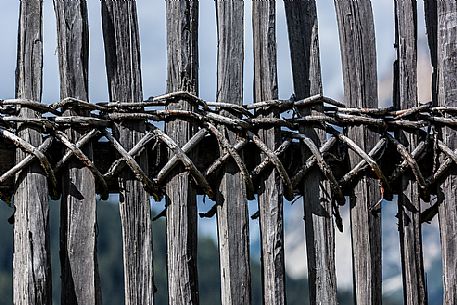 Typical dolomitic wood fence in Badia Valley, South Tyrol, Dolomites, Italy