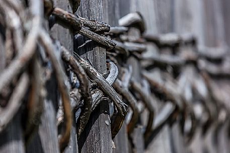 Typical dolomitic wood fence in Badia Valley, South Tyrol, Dolomites, Italy