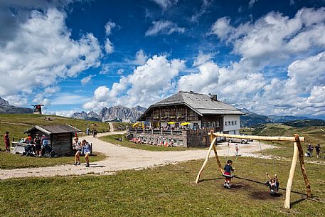 Tourists at Pralongi hut, Badia Valley, South Tyrol, Dolomites, Italy